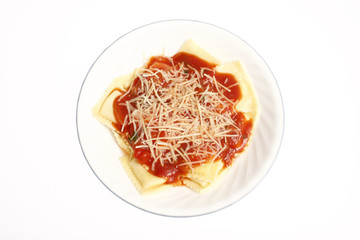 plate of ravioli with marinara sauce