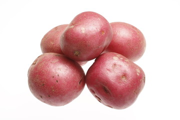 Red potatoes isolated on white.
