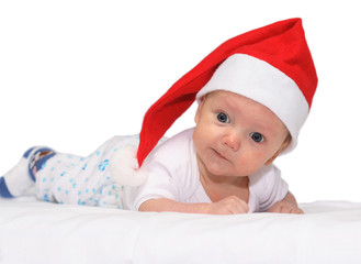 baby in the christmas cap.