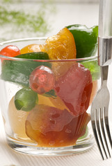 Candied fruits in a glass.