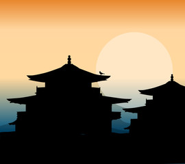 wooden pagoda at sunset in china