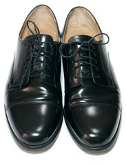 Shiny polished classic male black leather shoe
