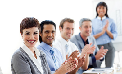 Fototapeta na wymiar Multi-ethnic business people clapping a good presentation