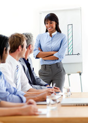 Fototapeta premium Self-assured businesswoman presenting to her team