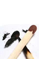 Wooden matches on white background