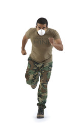 Military man in camouflage running with H1N1 mask