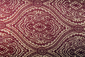 Beautiful damask burgundy fabric textured material background