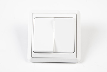 white double light switch isolated on white background