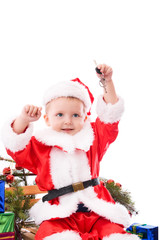 Happy toddler Santa with keys