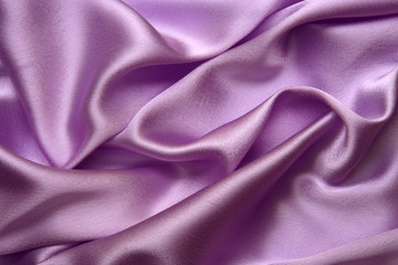 Beautiful and shiny violet satin background
