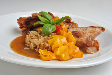 roasted delicious chicken on a white plate
