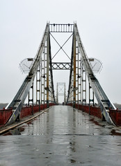 Lonely abandoned bridge in the rain in Kiev