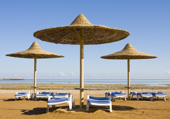 Beach on a sunny day. Hurghada city in Egypt.