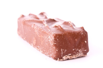 Bar of chocolate isolated on white.