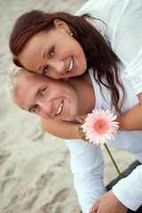 portrait of romantic couple by the beach
