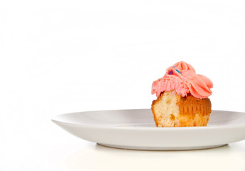 Delicious cupcake isolated on white background