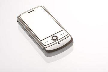 A cellphone on a glass table