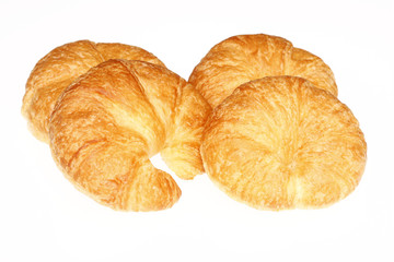 Fresh baked croissants on the table.