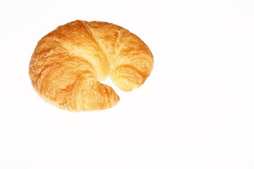 Fresh baked croissant isolated on white.