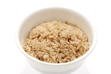 Bowl of rice on a table.