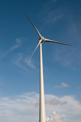 wind turbine against blue sky