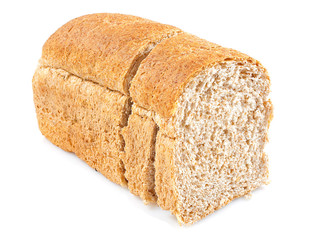 Whole grain bread loaf on a white background