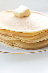 Pile of pancakes with butter