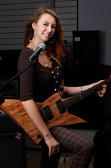 young female with rock guitar