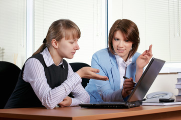 two female in office