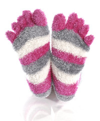 pink fuzzy toe socks with reflection on white background