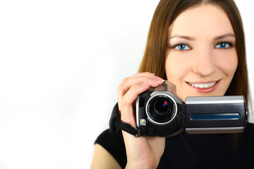woman holding a home video camera
