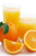 Orange with orange juice and the cut slices
