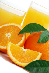 Orange with orange juice and the cut slices