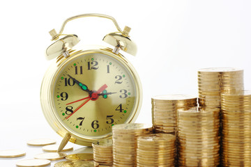 Time is money - clock dial and golden coins