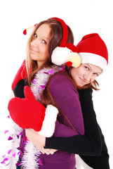 Portrait of beautiful sexy girls wearing santa claus clothes.