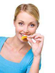 happy beautiful woman eats the chips