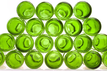 Bottoms of empty glass bottles on white background