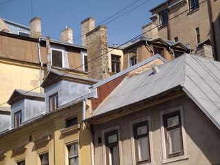 Fototapeta na wymiar Roofs, dormers and chimneys