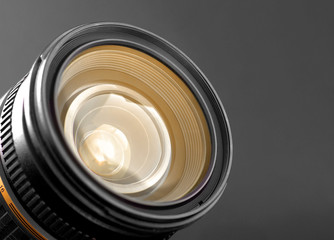 A close-up of a camera zoom lens