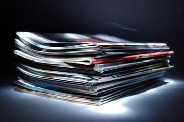 stack of magazines light-brush