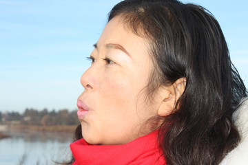 Chinese girl whistling