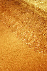 Fototapeta na wymiar Golden sand background