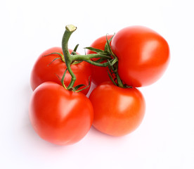 vine ripened tomatoes on white background