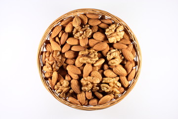 Almonds and walnuts in a round basket