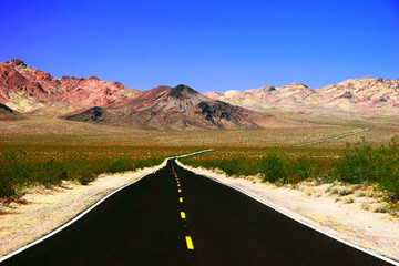 Road in lifeless landscape of   Death Valley. California. USA