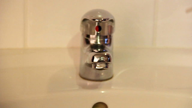 Water tap in use