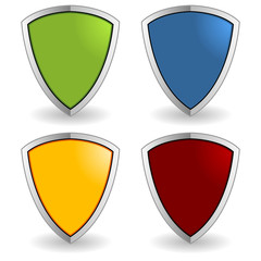 Empty colorful shields isolated over white background
