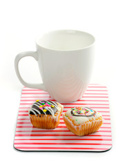 Muffins with cup of coffee