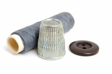 Sewing gear over white background