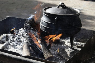 Cooking with a cast iron pot